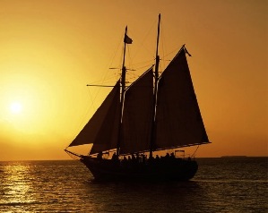 sailing at sea at sunset in schooner