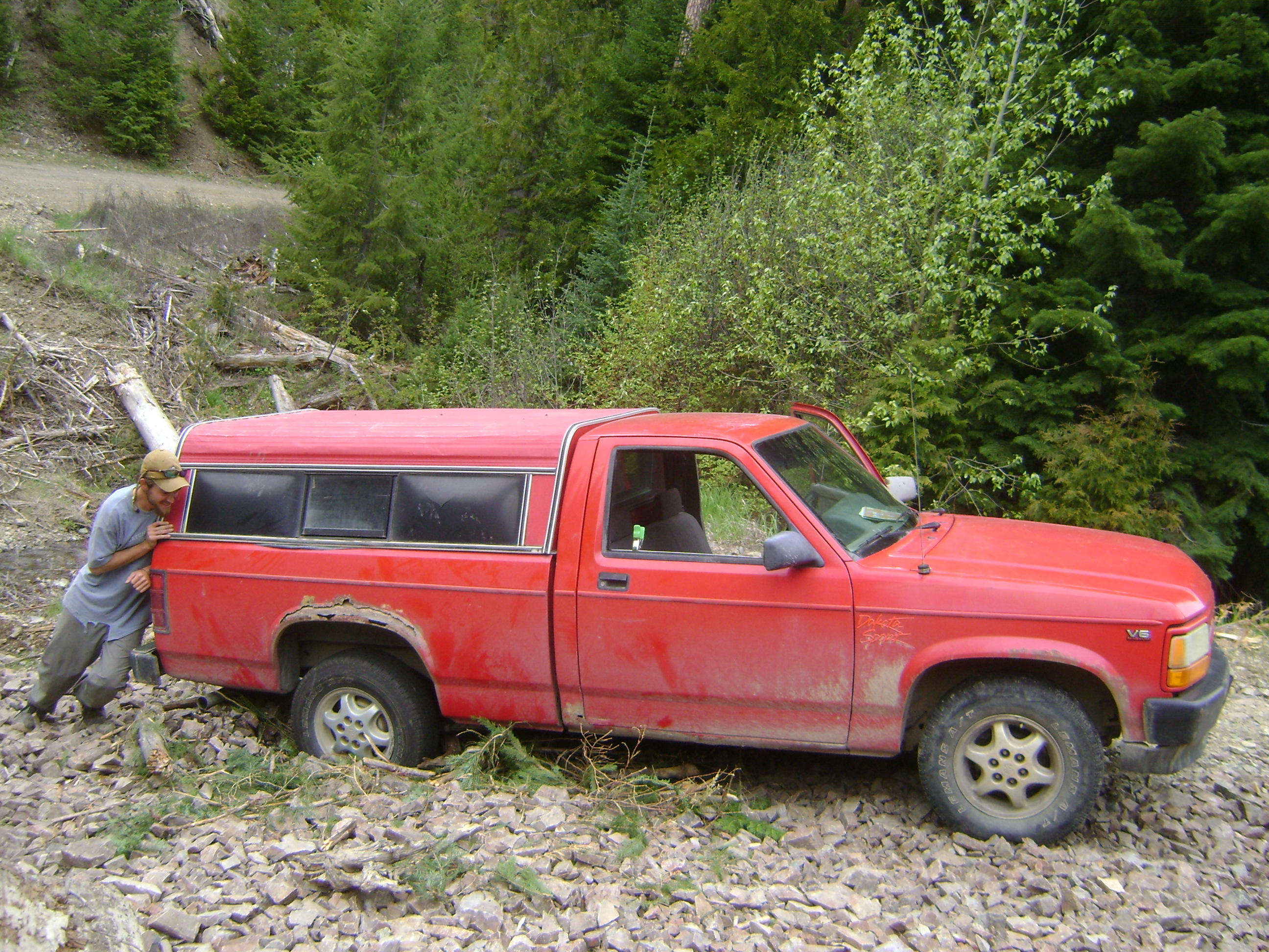 big red - the red rider truck - rob roberts and trout unlimited - pushing through the forest