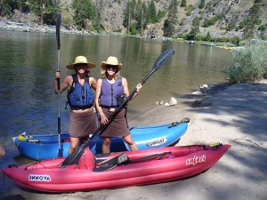 brianna randall  and cass kayaking the salmon river - on the horizon line