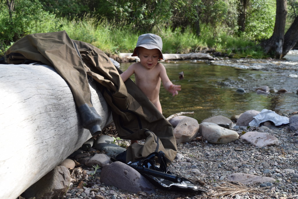 talon randall roberts getting ready to play with a snorkel at the creek