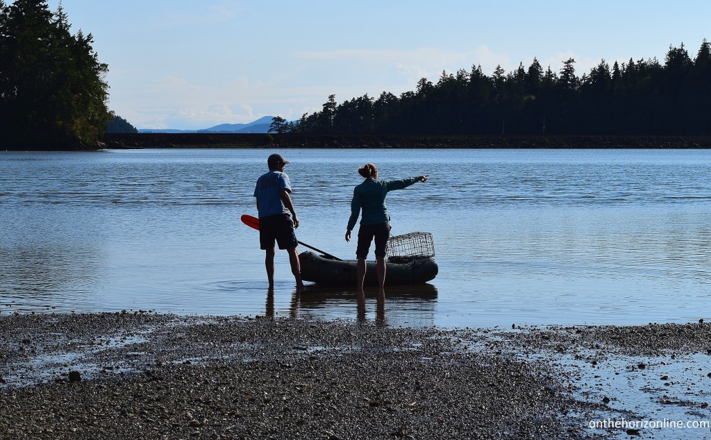 "Where would YOU drop the crab pot? And do you think it's weird that the trap is bigger than our packraft?"